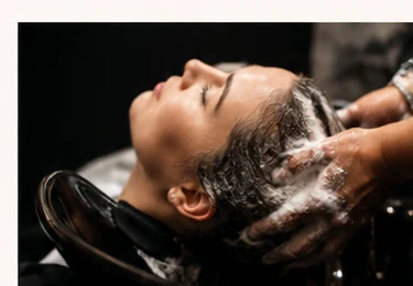 Professional salon shampoo service before hair color